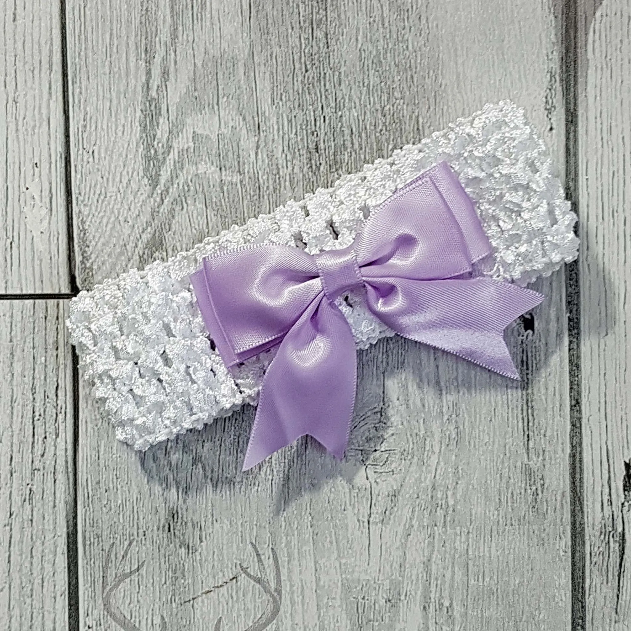 Baby girls headband with lilac satin bow