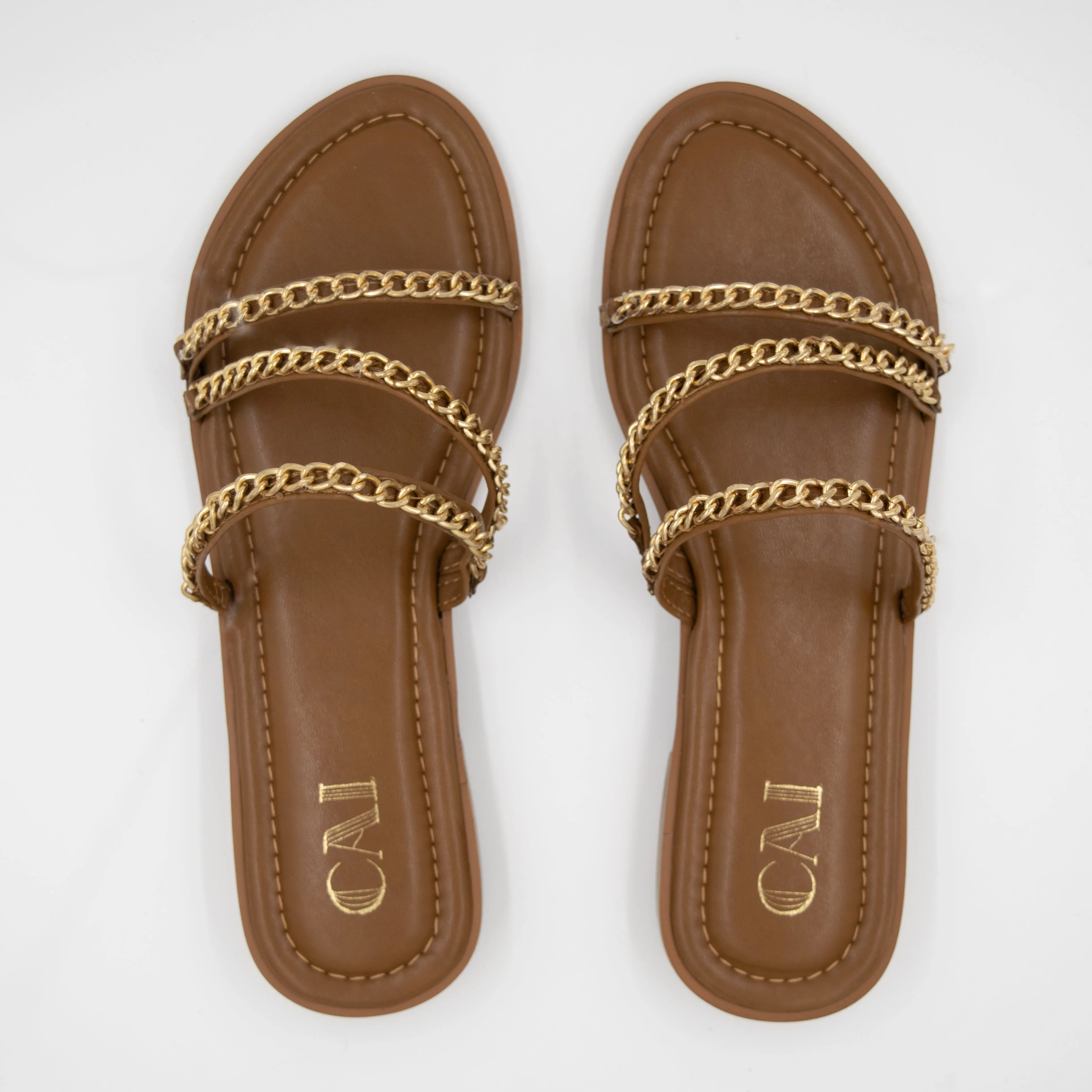 Three Strapped Tan Chained Flats