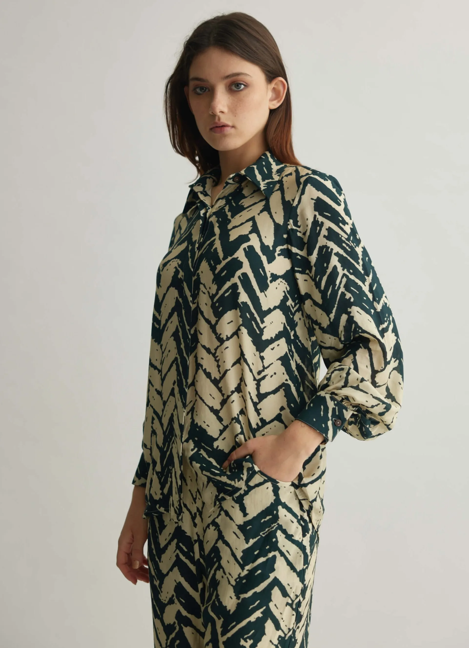 White and green chevron print shirt and pants